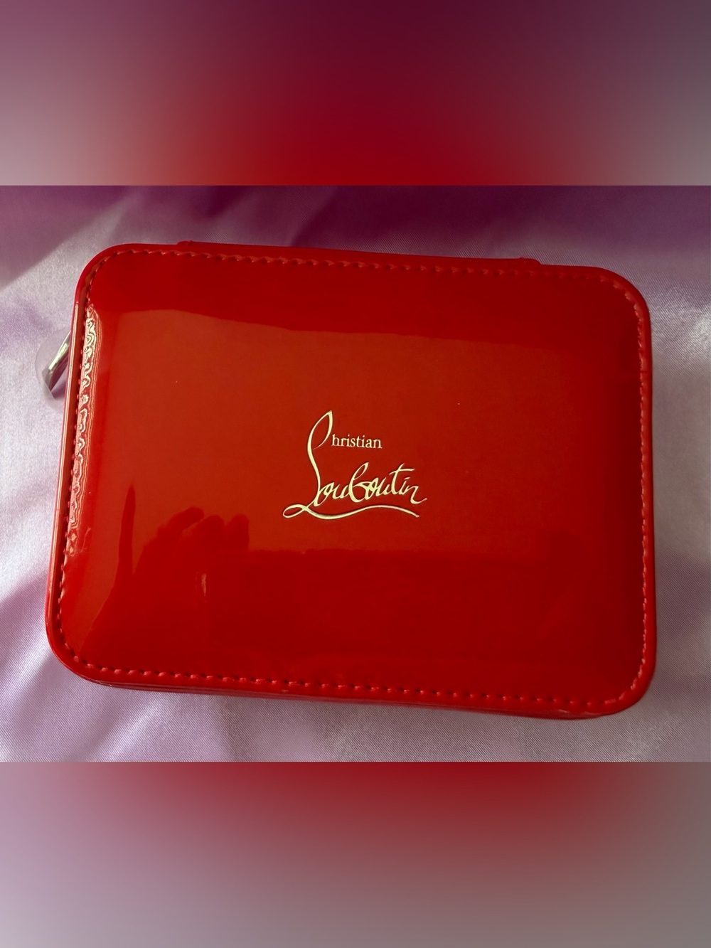 Christian Louboutin Red Patent Leather zipped jewelry beauty case with Gold Logo